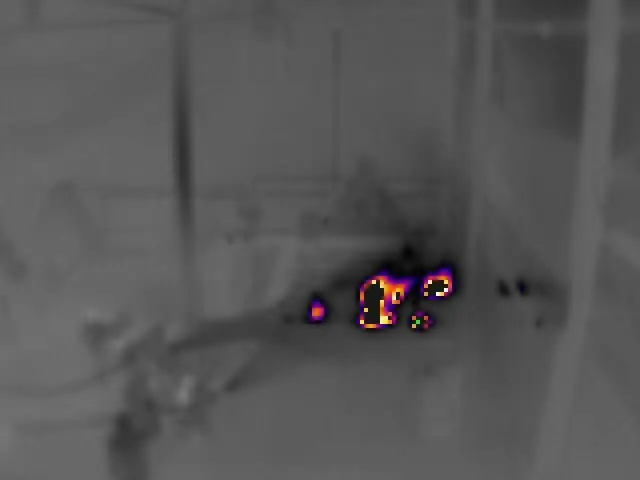 Thermal camera capture showing the heat signature of an early fire